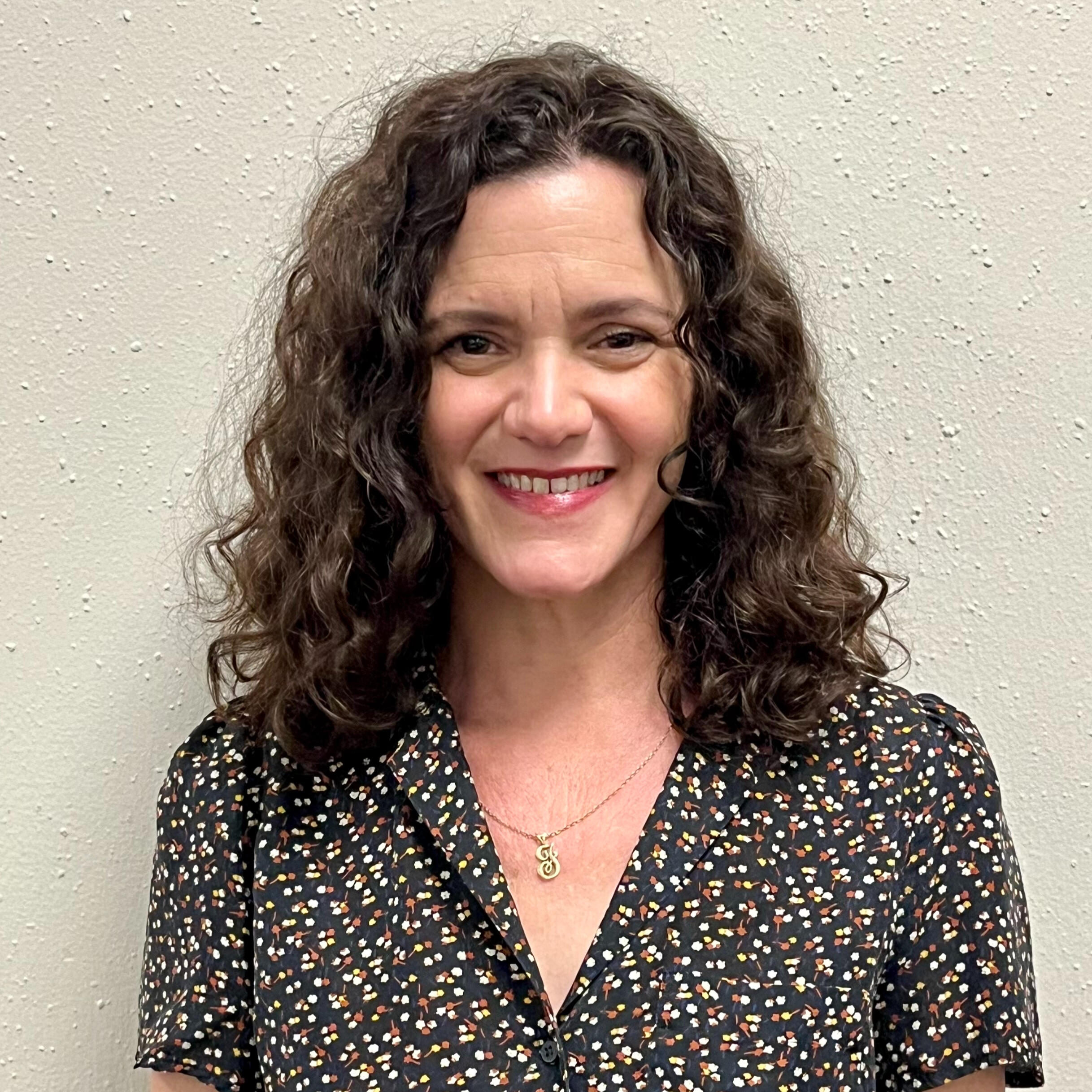 Genevieve Gallaway, administrative and operations leader, smiling portrait photo